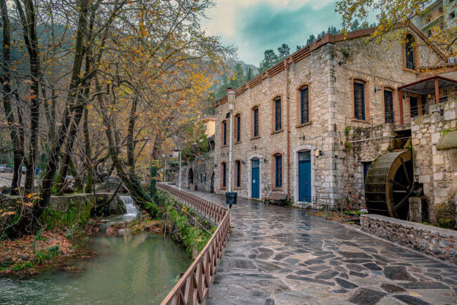 Bridge,,Waterfalls,,River,At,The,Old,Town,Of,Livadeia,,In
